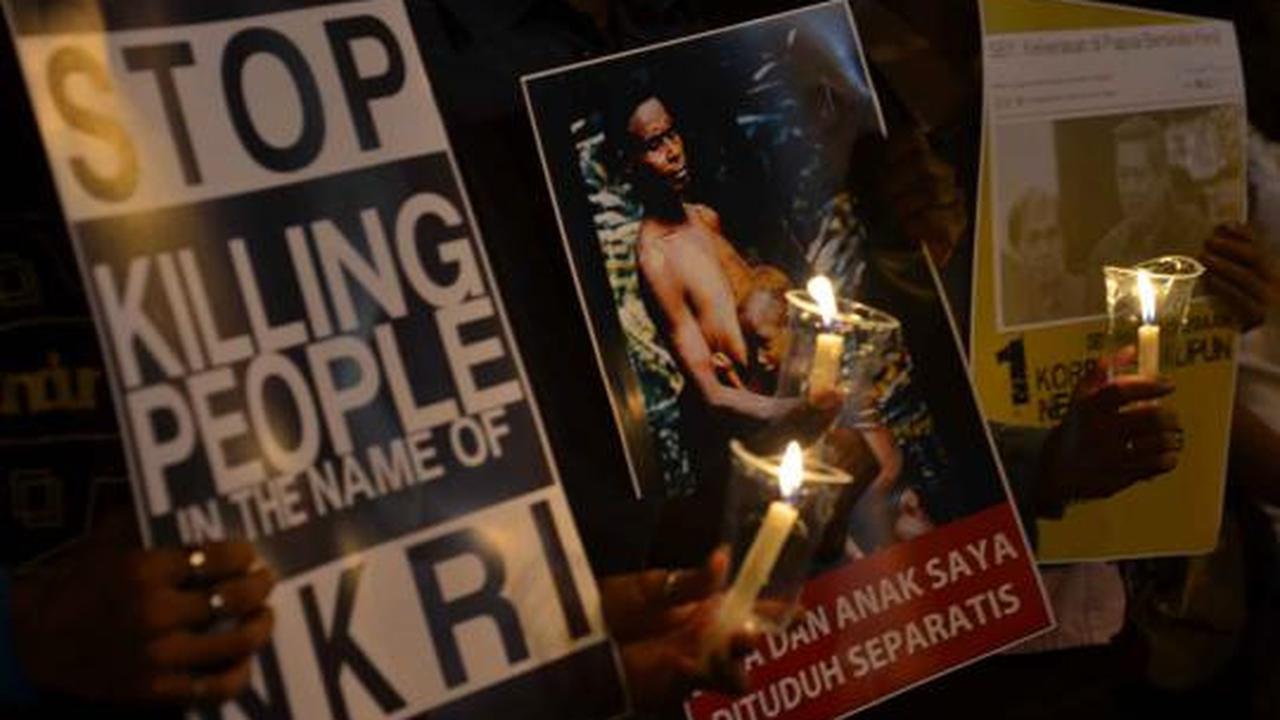 Aksi lilin solidaritas untuk Papua