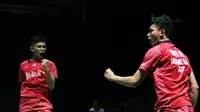 Ekspresi Fajar Alfian/Rian Ardianto saat melawan pasangan China, Liu Cheng/Zhang Nan pada perempat final Indonesia Open 2018 di Istora Senayan, Jakarta, (6/6/2018).  (Bola.com/Nick Hanoatubun)