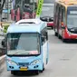 Tarif Bus Kota Terintegrasi Busway (BKTB) dengan Rute PIK-Monas turun harga, Jakarta, Senin (4/1/2016). Tarif BKTB yang semula Rp 6.000 turun menjadi Rp 3.500. (Liputan6.com/Yoppy Renato)