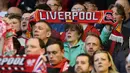 Suporter Liverpool memberikan dukungan kepada timnya pada laga Merseyside Derby melawan Everton di Stadion Anfield, Liverpool, Kamis (21/4/2016) dini hari WIB. (AFP/Paul Ellis)