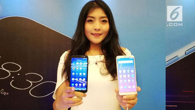 Model memegang smartphone baru Meizu, C9 dan M6T. Liputan6.com/ Andina Librianty