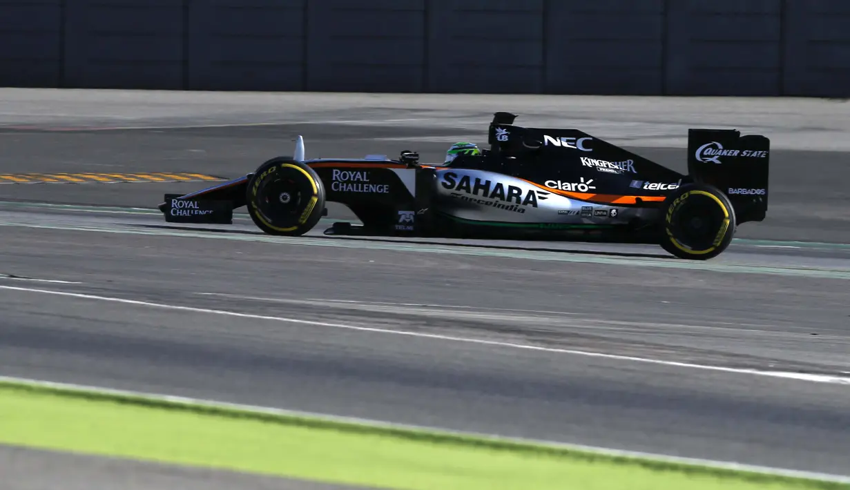 Pebalap Force India, Nico Hulkenberg  mencatat waktu tercepat 1m23.110s pada sesi test pramusim F1 hari ke-3 di Sirkuit Catalunya, Barcelona, Rabu (24/2/2016) WIB.  (REUTERS/Sergio Perez)