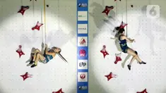 Atlet Panjat Tebing Putri Polandia, Natalia Kalucka (kiri) meluapkan kegembiraan usai menumbangkan Emma Hunt (AS) di Kejuaraan Panjat Tebing Dunia IFSC 2022 di Jakarta, Sabtu (24/9/2022). Natalia Kalucka menempati posisi kedua dengan catatan waktu 7,20 detik usai di babak Final kalah dari pemanjat asal China, Lijuan Deng. (Liputan6.com/Helmi Fithriansyah)