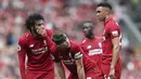 Para pemain Liverpool berdiskusi saat melawan West Ham pada laga Premier League di Stadion Anfield, Minggu (12/8/2018). Liverpool menang 4-0 atas West Ham. (AP/David Davies)