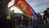 Ilustrasi bendera Eritrea. (David McNew/Getty Images/AFP)