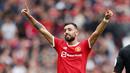 Bruno Fernandes - Pemain bernomor punggung 18 ini menjadi pemain MU paling anyar yang berhasil mencetak hattrick. Bruno sukses memborong tiga gol pada laga perdana Premier League 2021/2022 saat melawan Leeds United. (Foto: AFP/Adrian Dennis)