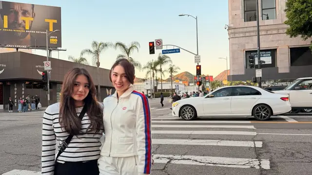 Padu Padan Jaket Pastel Angel Karamoy Saat Liburan di Amerika Serikat