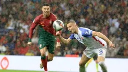 Menang 3-2, Cristiano Ronaldo dan kawan-kawan tinggal selangkah lagi menjadi tim pertama yang lolos ke putaran final Euro 2024 di Jerman. (AP Photo/Luis Vieira)