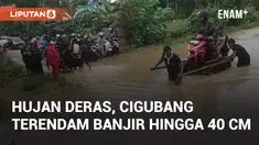 Hujan deras menyebabkan banjir di Kampung Cibugang, Desa Daroyon, Lebak. Akses jalan utama Gumuruh-Margamulya-Cileles terendam hingga 40 cm