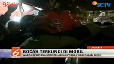 Warga & pengguna jalan Otista, panik, akibat adanya seorang bocah yg terkunci dan tertidur pulas di dalam mobil.