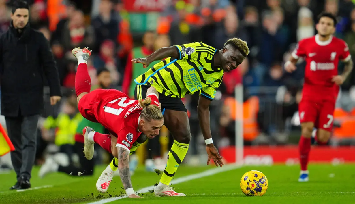 Hasil ini membuat Arsenal masih memimpin klasemen Liga Inggris dengan 40 poin. Sementara Liverpool di posisi kedua dengan tertinggal satu poin. (AP Photo/Jon Super)