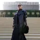 Pelantun lagu Matahariku itu memilih tampilan statement dengan oversized leather jacket berpotongan tegas.  [@agnezmo].