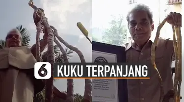 Pria ini memiliki panjang kuku 909,6 cm di tangan kiri.