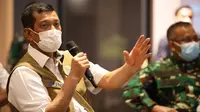 Ketua Satgas COVID-19 Doni Monardo memberikan restu pihak hotel layani karantina sementara bagi penumpang pesawat dari luar negeri pada 30-31 Desember 2020 di Bandara Soetta, Tangerang, Selasa (29/12/2020). (Badan Nasional Penanggulangan Bencana/BNPB)