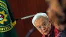   Anggoro Widjojo memperhatikan keterangan Suswono saat menjadi saksi atas kasusnya di Pengadilan Tipikor, Jakarta, Rabu (4/6/2014) (Liputan6.com/Faisal R Syam).