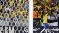 Willian merayakan gol ke gawang Venezuela (Reuters)