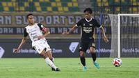 Kapten Persija Jakarta, Rizky Ridho (kiri) pada pertandingan melawan Dewa United di ajang BRI Super League 2025/2026. (Abdul Aziz/Bola.com)