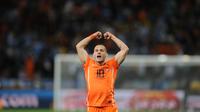 Ekspresi Wesley Sneijder usai mengantarkan Belanda menuju final Piala Dunia 2010. Sneijder memenangkan Silver Boot dengan mencetak lima gol dan satu assist. (AFP/Franck Fife)
