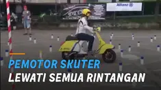 Pemotor ini sukses menyelesaikan ujian dan disambut tepuk tangan peserta lain.