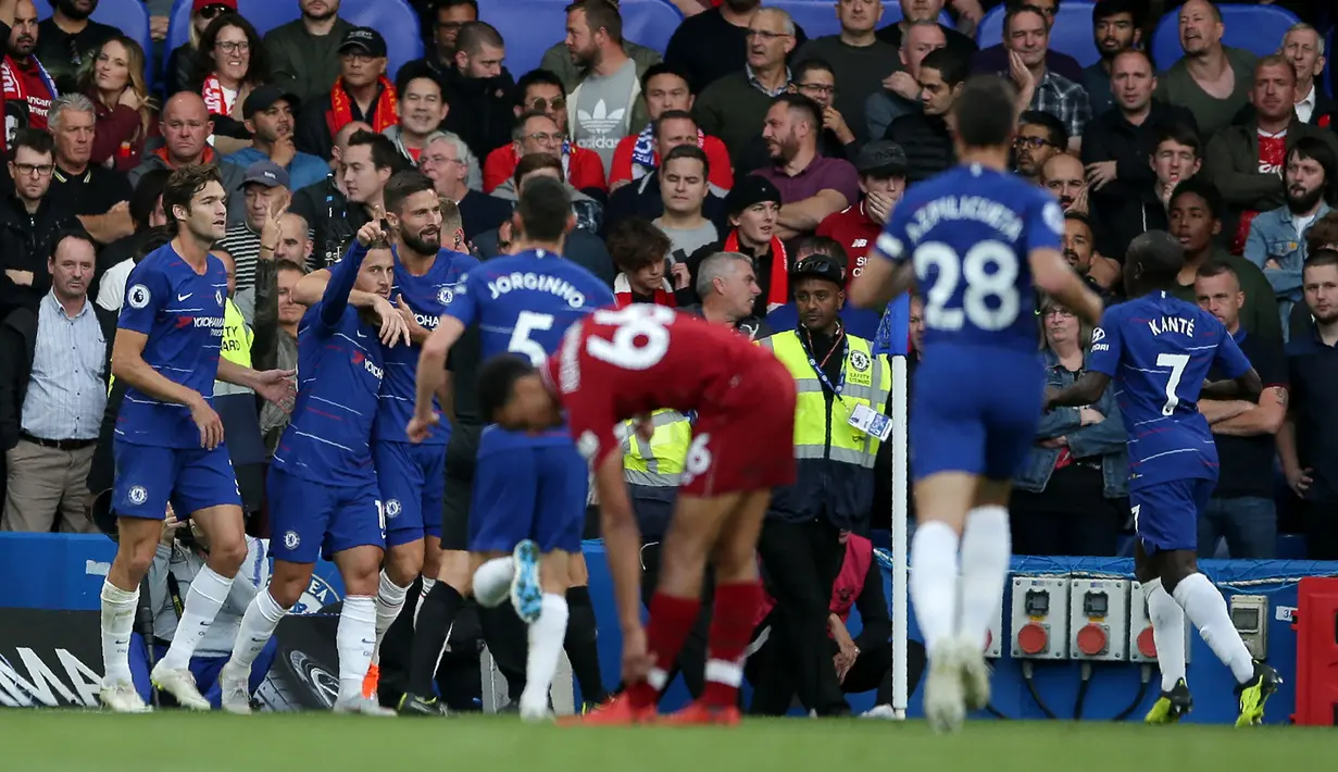Eden Hazard total mencetak 7 gol dan 2 assist dari total 18 laga saat menghadapi Liverpool di semua ajang kompetisi. Rinciannya adalah 4 gol dicetak di Liga Inggris, 1 gol di Liga Europa musim 2009/2010 dan 2 gol lagi dicetak di ajang EFL Cup. Gol terakhirnya ke gawang The Reds terjadi pada putaran ketiga EFL Cup 208/2019, di mana saat itu ia mencetak 1 gol dalam kemenangan Chelsea 2-1 atas Liverpool. (AFP/Daniel Leal)