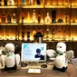 Keberadaan robot-robot di Dawn Cafe dimaksudkan lebih dari sekadar gimmick bagi pengunjung. (Foto: BEHROUZ MEHRI / AFP)