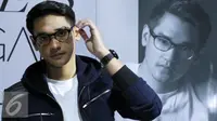 Afgan di peluncuran album ketiganya berjudul Sides. (Foto: Herman Zakharia/Liputan6.com)