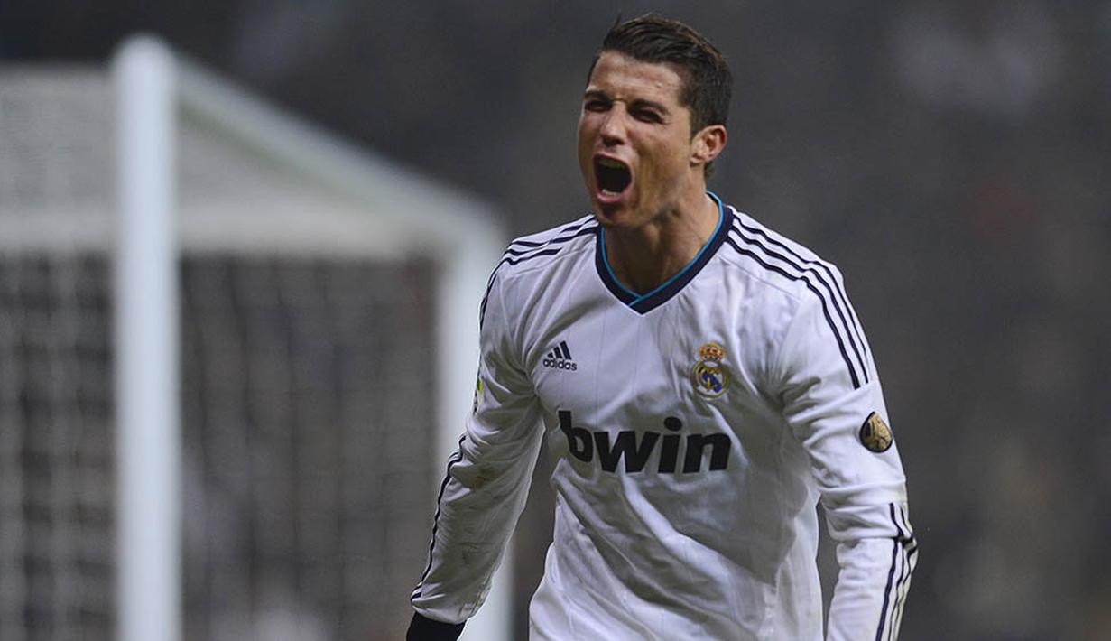 Cristiano Ronaldo - Pria berkebangsaan Portugal ini sukses meraih tiga kali gelar pemain terbaik dunia. Bintang Madrid itu berhasil meraih gelar pada tahun 2008, 2013 dan 2014. (AFP/Pierre-Philippe Marcou)