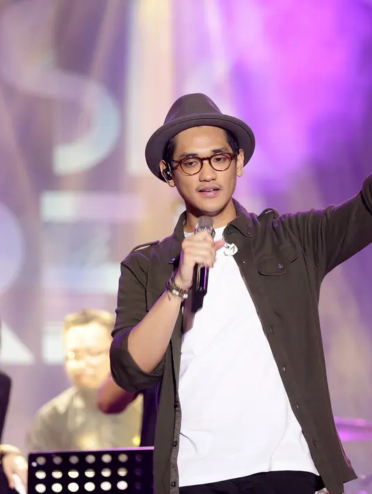 "Terima kasih untuk para fans, aku senang konser kaya gini karena lebih merasa dekat dengan kalian," tutur Afgan di Rolling Stones Cafe, Jakarta Selatan, Selasa (26/1/2016). (Andy Masela/Bintang.com)