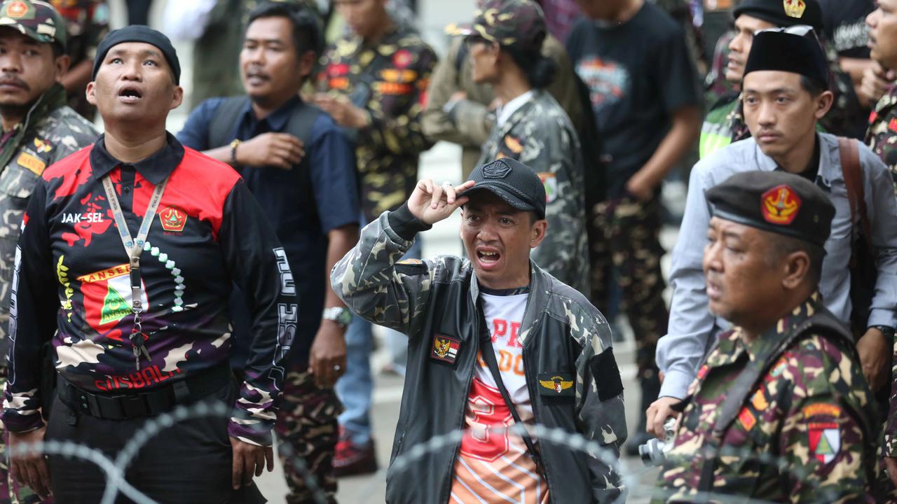 FOTO: Aksi Penolakan Banser Usai Penahanan Yaqut Cholil Qoumas