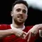 Pemain Liverpool asal Portugal #20, Diogo Jota, merayakan gol ketiga timnya selama pertandingan Liga Primer Inggris antara Fulham dan Liverpool di Craven Cottage di London pada 21 April 2024. Striker Liverpool Diogo Jota meninggal bersama saudaranya pada 3 Juli 2025 dini hari dalam sebuah kecelakaan lalu lintas di barat laut Spanyol, kata Garda Sipil Spanyol. (BENJAMIN CREMEL/AFP)