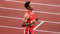 Sprinter Indonesia, Lalu Muhammad Zohri, setelah menyelesaikan lomba di round 1 lari 100 meter putra Olimpiade Tokyo 2020 di Olympic Stadium, Tokyo, Sabtu (31/7/2021). Zohri menempati posisi kelima dalam lomba itu. (Dok. NOC Indonesia)