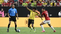 Borussia Dortmund menag atas Manchester United dengan skor 3-2. (Candice Ward/Getty Images/AFP)