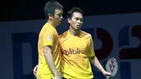 Ganda putra Indonesia Hendra Setiawan/Mohammad Ahsan mengantongi kemenangan pertama di penyisihan Grup A BWF Dubai World Superseries Finals 2015, Rabu (9/12/2015). (Liputan6.com/Humas PP PBSI)