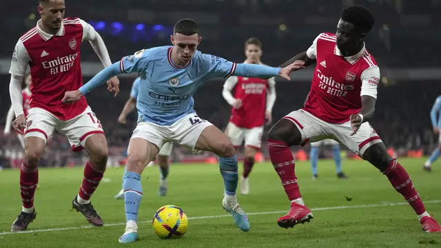 Foto: Manchester City Kudeta Puncak Klasemen Liga Inggris setelah Tumbangkan Arsenal di Kandangnya