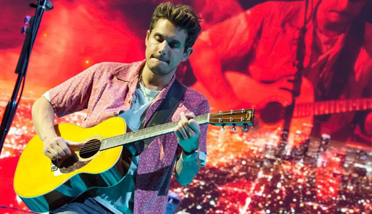 Menjalani gaya hidup sehat memang bukan hal mudah, terlebih bagi mereka yang sudah terbiasa mengonsumsi minuman beralkohol. Tak heran jika John Mayer meras bangga lantaran bisa mengatasi itu. (AFP/Suzane Cordeiro)