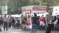 Ratusan massa aksi yang mengendarai Becak Motor (Bentor) di Kabupaten Gorontalo (Kabgor) kembali menolak kedatangan Pimpinan Front Pembela Islam (FPI) Habib Rizieq Shihab. (Arfandi Ibrahim/Liputan6.com)