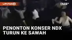 Konser NDX di lapangan parkir Artos Mall, Magelang pada Rabu (17/1/2024) menarik antusias penonton. Para penonton memenuhi venue konser hingga pergerakan terhambat. Sejumlah penonton pun nekat turun ke sawah di samping area konser.