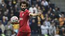 Selebrasi striker Liverpool, Mohamed Salah setelah Cody Gakpo mencetak gol penyeimbang 1-1 ke gawang Wolverhampton Wanderers pada laga pekan kelima Premier League 2023/2024 di Molineux Stadium, Wolverhampton, Sabtu (16/9/2023) malam WIB. (AP Photo/Rui Vieira)