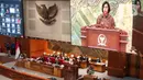 Menteri Keuangan (Menkeu) Sri Mulyani Indrawati menyampaikan pandangan pemerintah pada saat rapat Paripurna DPR RI Ke-13 Masa Persidangan II Tahun Sidang 2022-2023 di Kompleks Parlemen, Senayan, Jakarta, Kamis (15/12/2022). DPR menyetujui Rancangan Undang-undang Pengembangan dan Penguatan Sektor Keuangan menjadi UU PPSK. (Liputan6.com/Angga Yuniar)
