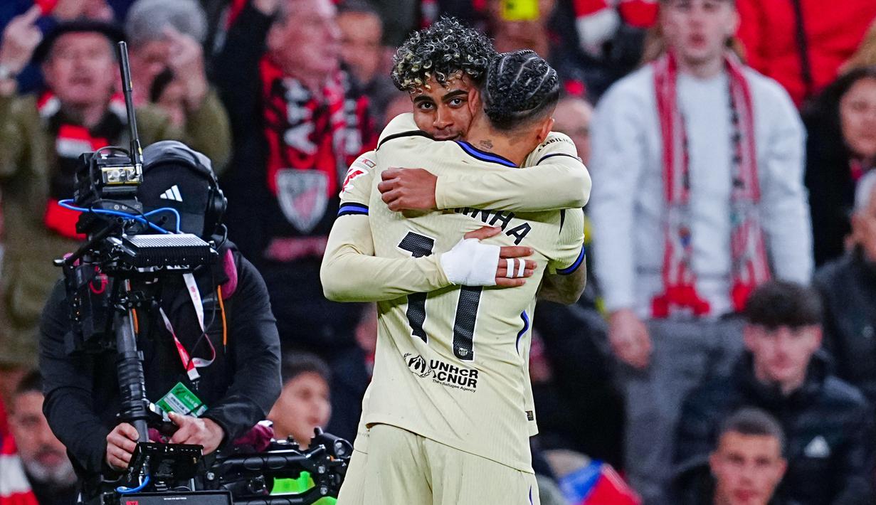 Barcelona meraih kemenangan di pertandingan jornada ke-27 La Liga 2025/2026. Berhadapan dengan Athletic Bilbao, Las Azulgrana menang dengan skor tipis 0-1. Barca berhasil membawa pulang tiga poin dari San Mames berkat gol semata wayang Lamine Yamal. (AP Photo/Miguel Oses)