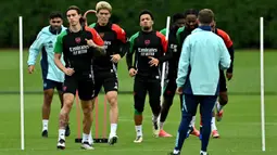 Sesi latihan Arsenal ini bagian persiapan menghadapi lanjutan pertandingan Liga Champions 2024/2025 melawan Paris Saint-Germain. (Glyn KIRK/AFP)