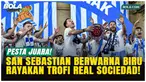Real Sociedad merayakan gelar Copa del Rey di San Sebastian usai menang adu penalti 4-3 atas Atletico Madrid, Minggu (19/4/2026). Ribuan suporter turun ke jalan merayakan kemenangan dramatis tim kesayangan mereka.
