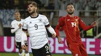 Pada menit ke-70 Jerman unggul 2-0 melalui Timo Werner. Striker Chelsea tersebut berhasil memanfaatkan umpan Thomas Mueller di dalam kotak penalti dengan sepakan kerasnya. (AP/Boris Grdanoski)