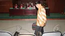 Mantan Bupati Bangkalan, Fuad Amin bersiap memberikan kesaksian di Pengadilan Tipikor, Jakarta, Senin (23/3/2015). Fuad menjadi saksi Antonius Bambang Djatmiko atas kasus dugaan suap jual beli gas alam di Bangkalan, Jatim. (Liputan6.com/Helmi Afandi)
