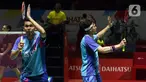 Reaksi pebulu tangkis ganda putra Indonesia Fajar Alfian/Muhammad Rian usai mengalahkan pebulu tangkis ganda putra Taiwan Chang Ko Chi/Po Li Wei pada babak 16 besar turnamen Daihatsu Indonesia Masters 2023 di Istora Senayan, Jakarta, Kamis (26/1/2023). Fajar/Rian mengalahkan Chang Ko Chi/Po Li Wei dengan skor 13-21, 21-9, dan 21-14. (Liputan6.com/Herman Zakharia)