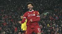 Wajah Mohamed Salah setelah mencetak quattrick ke gawang Watford di Anfield, Liverpool, (17/3/2018). Quattrick Mohamed Salah terjadi pada menit ke-4’, 43’, 77’, 85’. (Anthony Devlin/PA via AP)