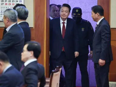 Presiden Korea Selatan yang dimakzulkan, Yoon Suk Yeol, tiba untuk menghadiri sidang pemakzulannya di Mahkamah Konstitusi di Seoul pada 21 Januari 2025. (Kim Hong-Ji/POOL/AFP)