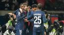 Sementara itu, Dua gol Ousmane Dembele dan Bradley Barcola membuat PSG untuk sementara mengukuhkan Les Parisiens di puncak klasemen dengan mengoleksi 42 poin. (AP Photo/Michel Euler)
