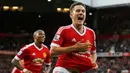 Ander Herrera merayakan gol yang dicetaknya ke gawang Liverpool di Stadion Old Trafford, Inggris. Sabtu (12/9/2015). (Action Images via Reuters/Carl Recine)