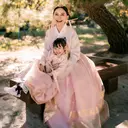 Rossa Bagikan Potret Liburan di Korea Bersama Raina, Kompak Pakai Hanbok Pink
